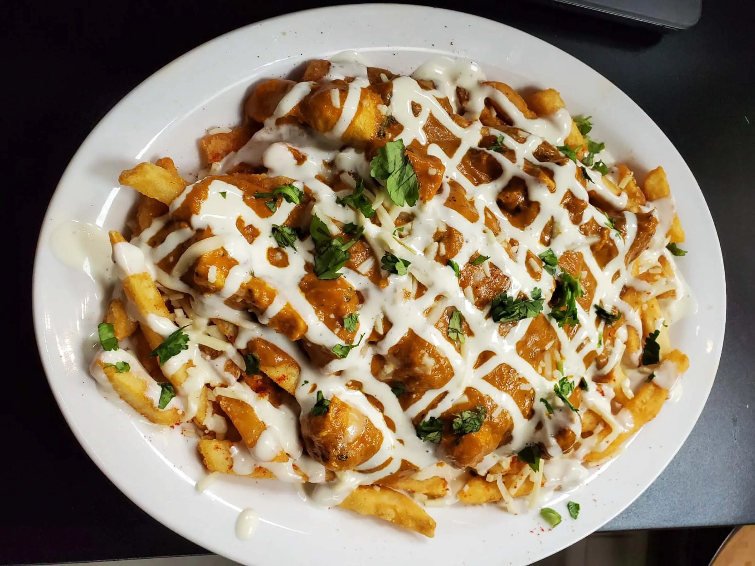 Butter Chicken Poutine